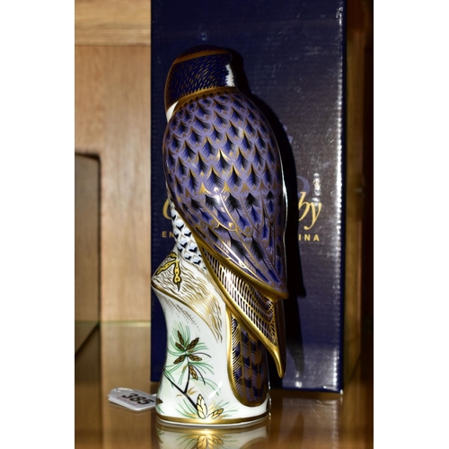 385 - A BOXED ROYAL CROWN DERBY PAPERWEIGHT 'Peregrine Falcon' with gold stopper