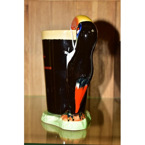 387 - A CARLTON WARE GUINNESS ADVERTISING JUG, with Toucan handle, height 17.5cm