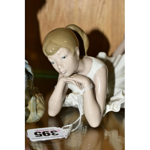 395 - THREE NAO FIGURES, comprising Ballerina, pensive, length 22.5cm, a boy sitting with rabbit and satch... 