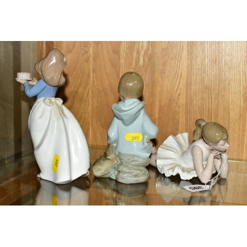 395 - THREE NAO FIGURES, comprising Ballerina, pensive, length 22.5cm, a boy sitting with rabbit and satch... 