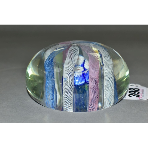 398 - A 20TH CENTURY FRENCH GLASS PAPERWEIGHT, the clear glass containing eight coloured air twists arched... 