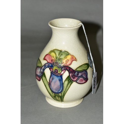 400 - A MOORCROFT POTTERY BALUSTER SHAPED VASE, 'Orchid' pattern on cream ground, impressed and painted ba... 