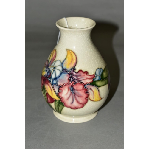 400 - A MOORCROFT POTTERY BALUSTER SHAPED VASE, 'Orchid' pattern on cream ground, impressed and painted ba... 