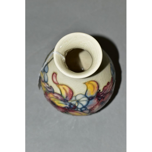 400 - A MOORCROFT POTTERY BALUSTER SHAPED VASE, 'Orchid' pattern on cream ground, impressed and painted ba... 