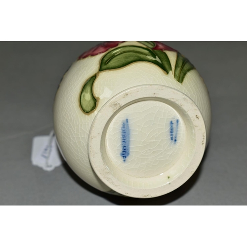 400 - A MOORCROFT POTTERY BALUSTER SHAPED VASE, 'Orchid' pattern on cream ground, impressed and painted ba... 