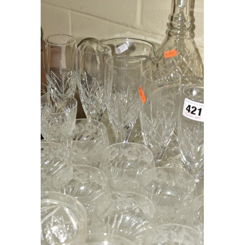 421 - A GROUP OF DRINKING GLASSES, DECANTERS ETC, including Stuart and Edinburgh crystal, an early 19th ce... 