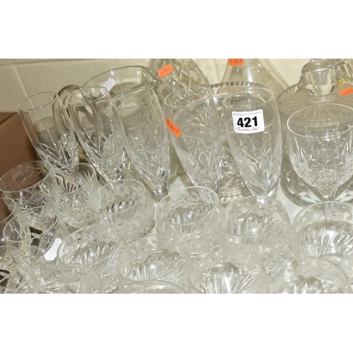 421 - A GROUP OF DRINKING GLASSES, DECANTERS ETC, including Stuart and Edinburgh crystal, an early 19th ce... 