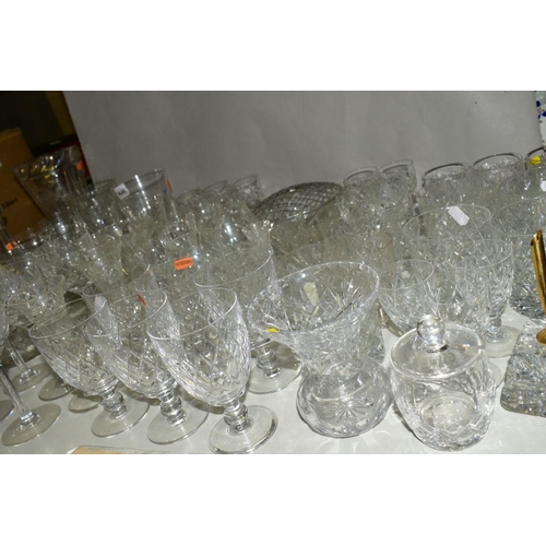 436 - A COLLECTION OF DRINKING GLASSES, VASES, DECANTERS, etc, including tumblers, hock glasses, liqueur g... 