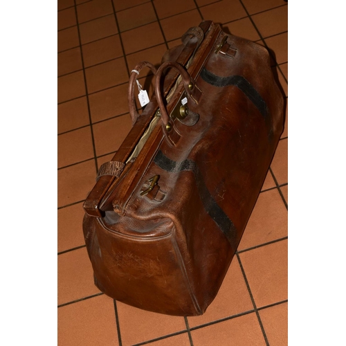 454 - A LARGE VINTAGE LEATHER GLADSTONE BAG, with two straps, canvas lined interior, wooden batons to base... 