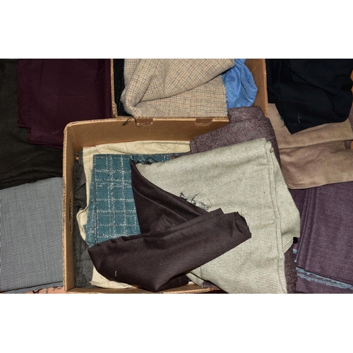 459 - A LARGE COLLECTION OF END OF ROLLS OF WOOL FABRICS, including Made in Scotland tweeds, heather colou... 