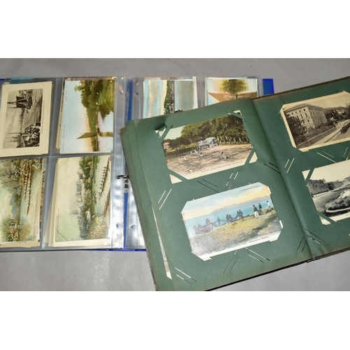 465 - A COLLECTION OF APPROXIMATELY TWO HUNDRED AND FIFTY THREE POSTCARDS, in two albums, featuring Monume... 