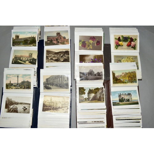 467 - A COLLECTION OF APPROXIMATELY TWO HUNDRED AND FIFTY FIVE POSTCARDS, in four albums, featuring London... 