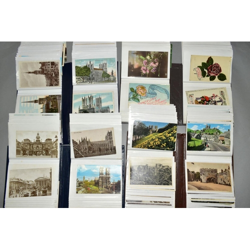 467 - A COLLECTION OF APPROXIMATELY TWO HUNDRED AND FIFTY FIVE POSTCARDS, in four albums, featuring London... 