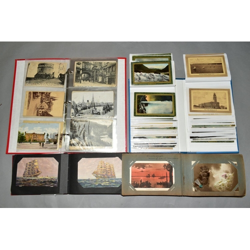 474 - THREE ALBUMS OF APPROXIMATELY TWO HUNDRED AND SEVENTY FIVE POSTCARDS from Europe, The Near East and ... 