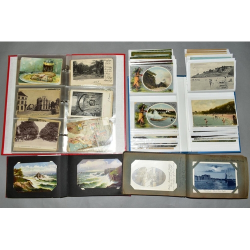 474 - THREE ALBUMS OF APPROXIMATELY TWO HUNDRED AND SEVENTY FIVE POSTCARDS from Europe, The Near East and ... 