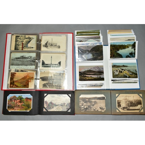 474 - THREE ALBUMS OF APPROXIMATELY TWO HUNDRED AND SEVENTY FIVE POSTCARDS from Europe, The Near East and ... 