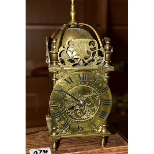 479 - TWO LATE 19TH CENTURY MANTEL CLOCKS AND BRASS LANTERN CLOCK, comprising an oak cased eight day mante... 