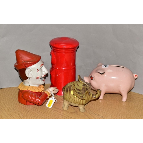 482 - FOUR MONEY BOXES, comprising a reproduction cast iron clown money box and three ceramic money boxes ... 