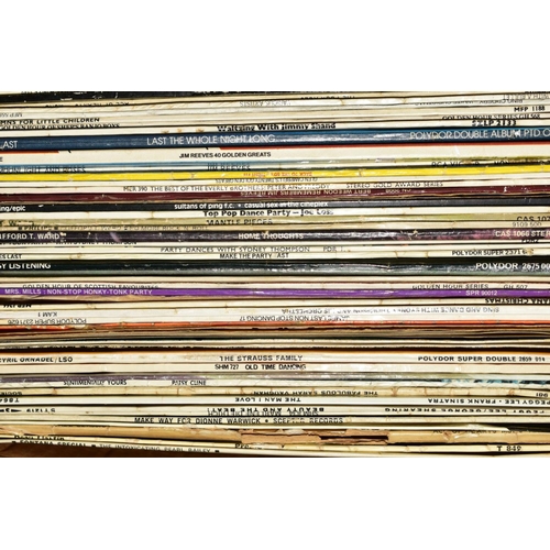 484 - A BOX OF SINGLES RECORDS AND A BOX OF L.P'S, artists include The Rolling Stones, Manfred Mann, Nat K... 