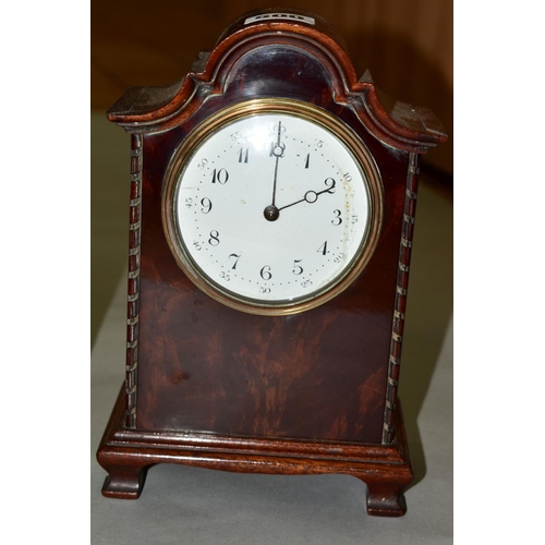 500 - TWO EDWARDIAN MAHOGANY MANTEL CLOCKS, both with wavy domes and white enamel dials, one with inlaid c... 