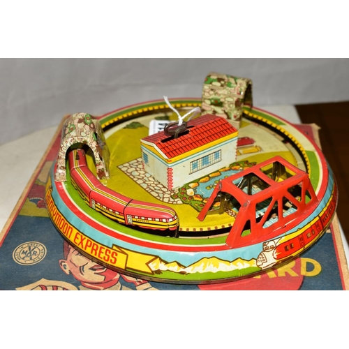 514 - A BOXED LOUIX MARX TINPLATE CLOCKWORK 'THE HONEYMOON EXPRESS' TRAIN, multi-coloured lithographed tin... 