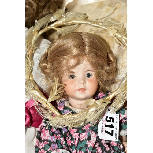 517 - AN ARMAND MARSEILLE BISQUE HEAD DOLL, imprinted number 390, having opening and closing eyes, teeth, ... 