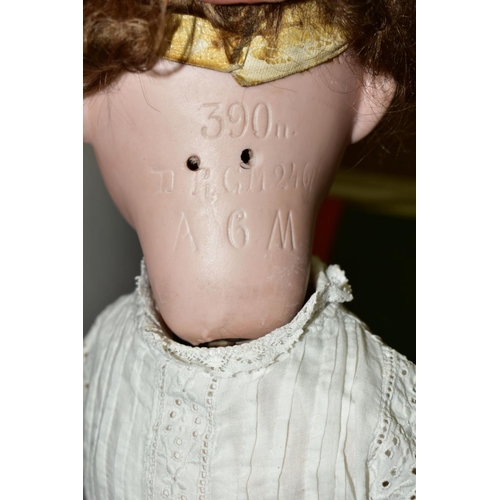 519 - AN ARMAND MARSEILLE BISQUE HEAD DOLL, nape of neck marked 'Armand Marseille 390n D.R.G.M. 246/1 A6M'... 