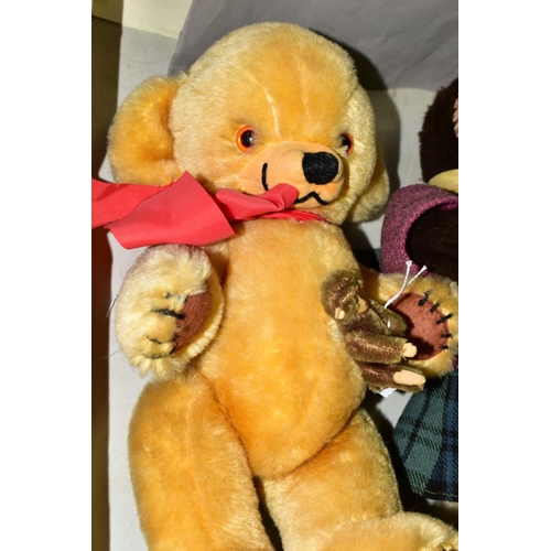 521 - A MERRYTHOUGHT GOLDEN PLUSH CHEEKY BEAR, some minor fading to fur and pads, label to right foot, bel... 