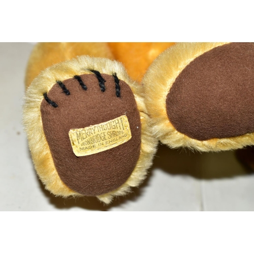 521 - A MERRYTHOUGHT GOLDEN PLUSH CHEEKY BEAR, some minor fading to fur and pads, label to right foot, bel... 