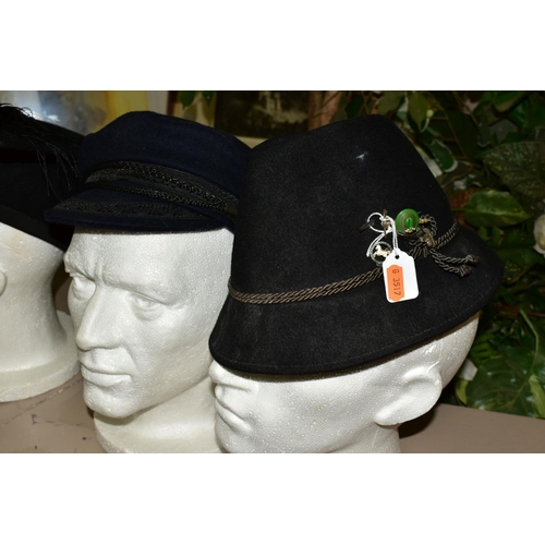 537 - FOUR HATS, include a Naval officers cap by Sanders and Brightman, size 6 3/4, Ede and Ravenscroft mo... 