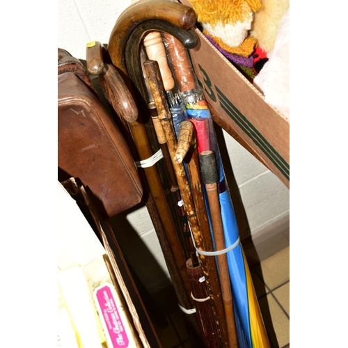 540 - THREE BOXES AND A CASE AND LOOSE WALKING STICKS AND UMBRELLAS, leather bag and box, assorted tins in... 