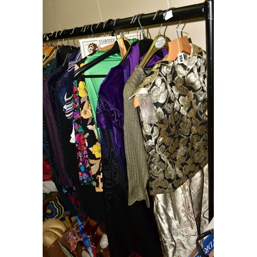 554 - A CLOTHES RAIL OF LADIES WEAR to include dresses, blouses, evening wear, coats and jackets, Eastex, ... 