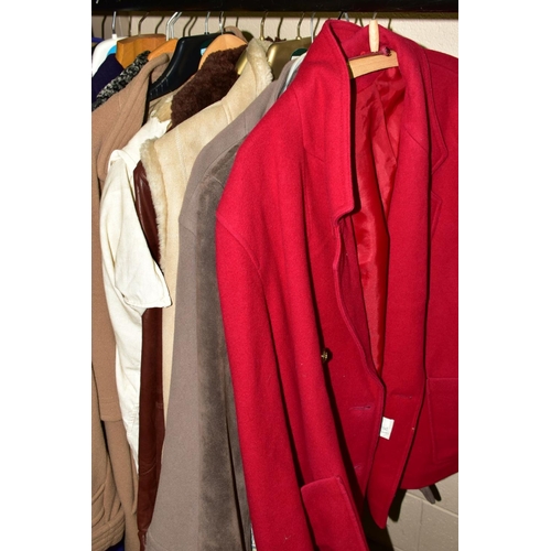 554 - A CLOTHES RAIL OF LADIES WEAR to include dresses, blouses, evening wear, coats and jackets, Eastex, ... 