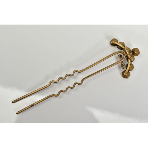 74 - A PASTE HAIR PIN, the hinged head of curved design set with colourless paste, length 94mm