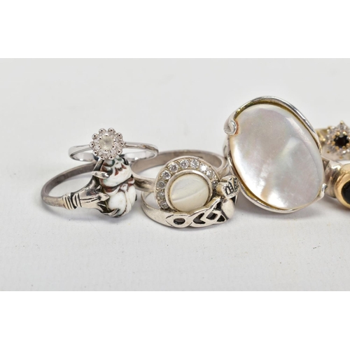 75 - A SELECTION OF RINGS, to include a cluster ring, designed with a central circular cut sapphire, a mo... 