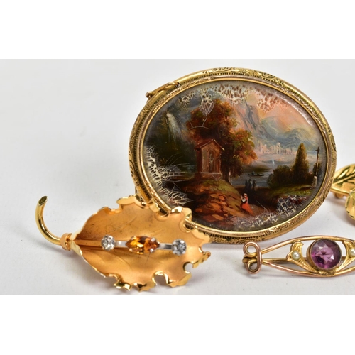 76 - A SELECTION OF FOUR BROOCHES, to include a large yellow metal oval panel depicting a shrine and lady... 