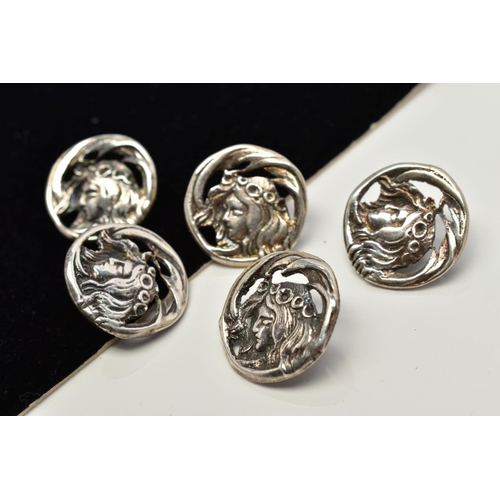 79 - FIVE WHITE METAL BUTTONS, each of circular design depicting a lady with flowers in her hair