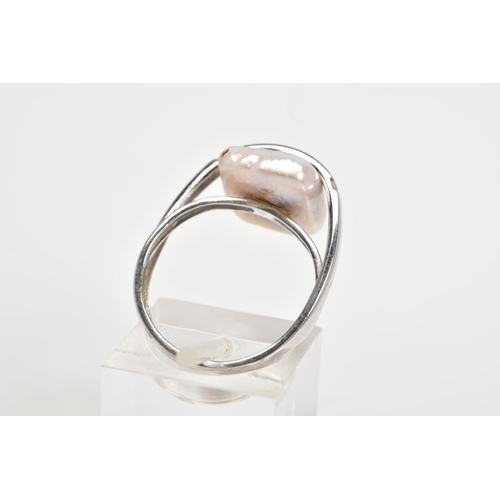 81 - A 9CT WHITE GOLD RING, designed as a square mother of pearl centre with a vertical crossover bar set... 