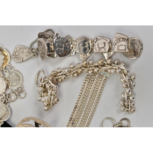 83 - A SELECTION OF JEWELLERY, to include a chain mail bracelet, a bangle bracelet, an identification bra... 