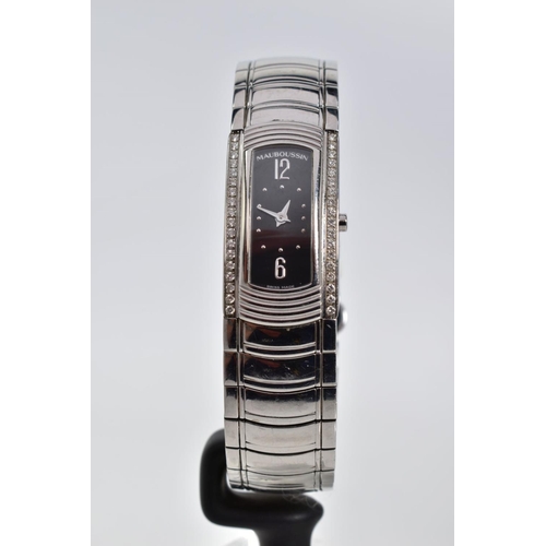 85 - A LADIES MAUBOUSSIN WRISTWATCH IN STAINLESS STEEL AND DIAMOND, oblong case measuring 32mm x 17.9mm, ... 