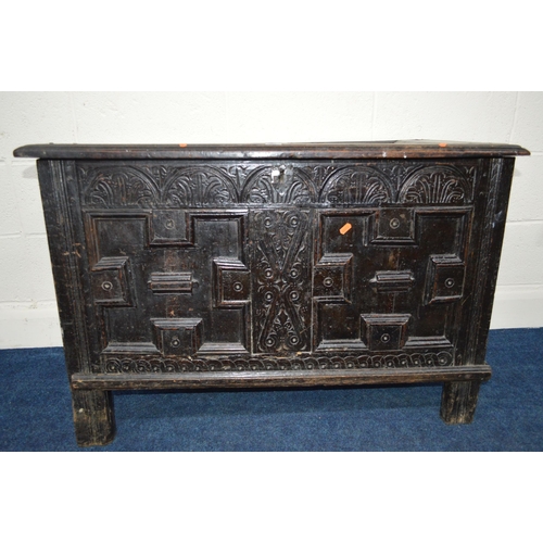 1363 - A 17TH CENTURY CARVED OAK JOINT COFFER, the hinged moulded cover above lunette carved frieze and dou... 