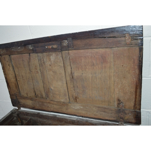 1363 - A 17TH CENTURY CARVED OAK JOINT COFFER, the hinged moulded cover above lunette carved frieze and dou... 