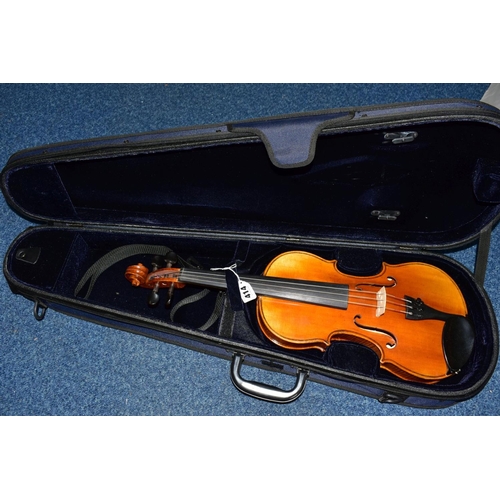 414 - A MODERN VERACINI VIOLIN with a two piece back and a modern case