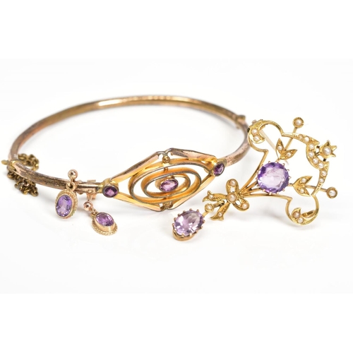 10 - AN AMETHYST COLLECTION OF JEWELLERY to include an early 20th Century amethyst gold plated oval hinge... 