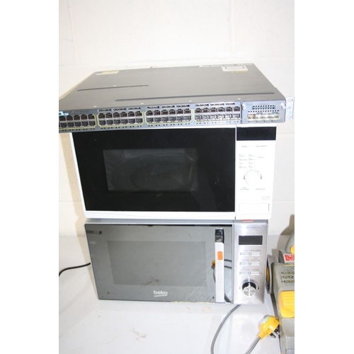 1107 - A BEKO MICROWAVE, a Tesco microwave, a Dyson DC04 vacuum cleaner and a Cisco C3KX-NM-10G network swi... 