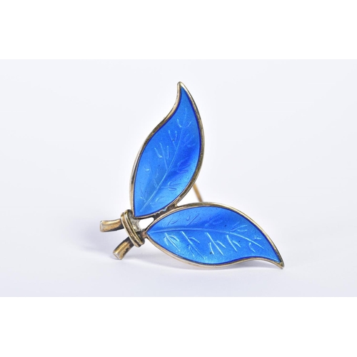 131 - WILLY WINNAESS FOR DAVID ANDERSEN, a Norwegian silver gilt and blue enamel brooch of two leaf form, ... 