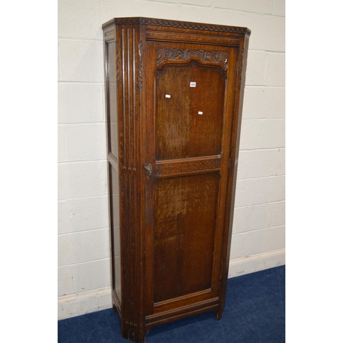 1312 - AN EARLY TO MID 20TH CENTURY OAK SINGLE DOOR HALL ROBE, with canted front corners, width 76cm x dept... 