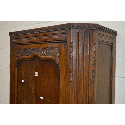 1312 - AN EARLY TO MID 20TH CENTURY OAK SINGLE DOOR HALL ROBE, with canted front corners, width 76cm x dept... 