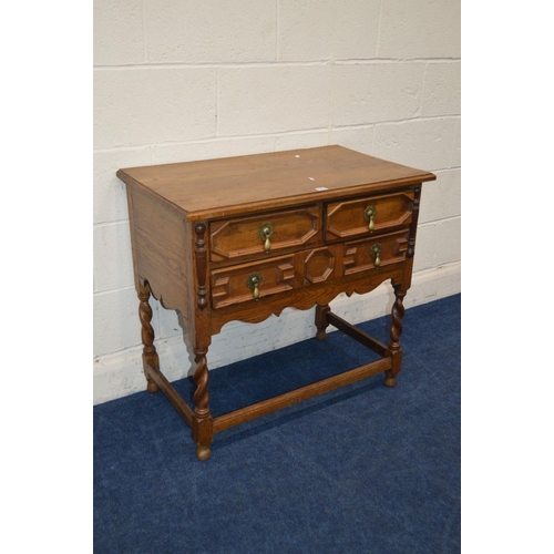 1314 - AN EARLY 20TH CENTURY OAK SIDE TABLE, four assorted geometric fronted drawers on barley twist legs u... 