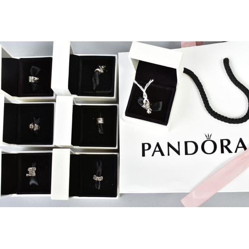 150 - A SELECTION OF PANDORA CHARMS, to include seven charms each within original box, with designs such a... 